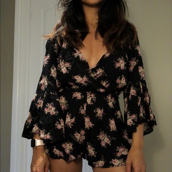 Floral romper with long flared sleeves - Picture 1 of 4